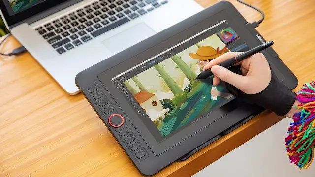 person drawing on xp pen display drawing tablet