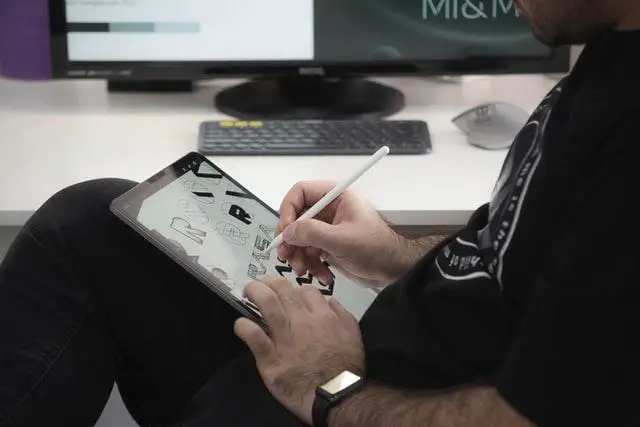 Person using Standalone Drawing Tablet on his lap