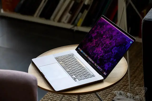 Apple macbook pro 16 inch sitting on round table